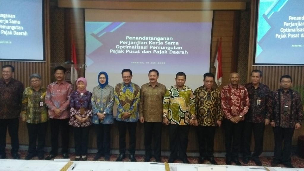 Penandatanganan Perjanjian Kerjasama  Antara DJP, DJPK, dan Pemerintah Kota Denpasar